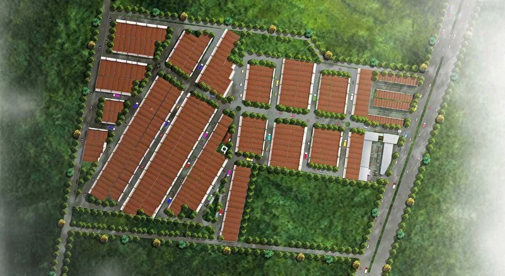 Masterplan aerial Bizpark Banjarmasin Commercial Estate, menunjukkan tata letak kompleks pergudangan dan komersial dengan deretan bangunan beratap merah bata, area hijau, jalan, dan vegetasi yang terencana rapi dari pandangan atas.